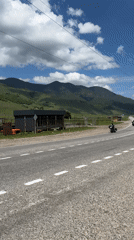 Morning traffic observed on mountain road in Markhua, Russia