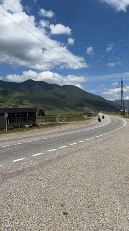Morning traffic observed on mountain road in Markhua, Russia