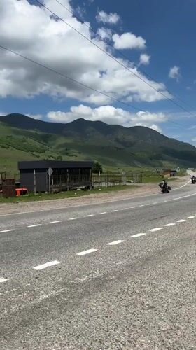 Morning traffic observed on mountain road in Markhua, Russia