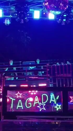 Festival night in Viadana: floats, fairground rides, and lights