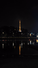 Rainy night scenes captured around illuminated Da Lat lakefront