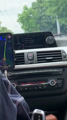 Digital captures show navigation display and music hashtag in Belgrade