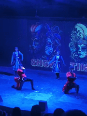 Blue-lit stage dance performance in Kuşadası, Turkey