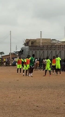 Soccer training session held on dirt field in Bukuru