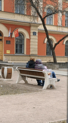 Street musician performs as daily life unfolds in Saint Petersburg