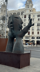 Coastal city walk documented: sculptures, seagulls, food, marina scenes