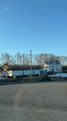 Drive-by footage captures wooden human sculpture in Votkinsk, Russia