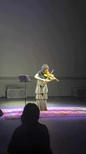 Solo musicians perform on stage in Almaty