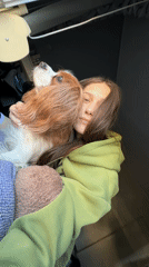 Woman poses with Cavalier King Charles Spaniel in Sofia