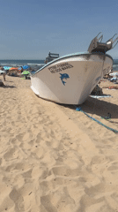 Coastal works and water sports side by side at Costa da Caparica