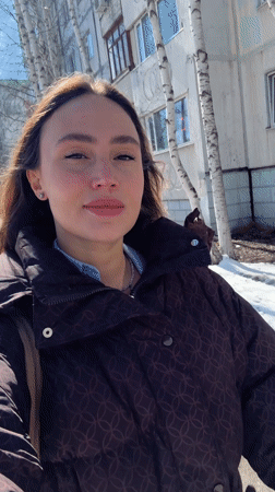 Woman records selfie video while walking in Surgut