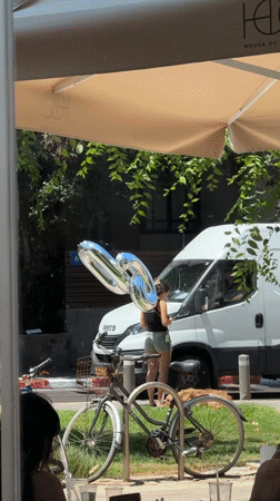 A Tel Aviv birthday morning: balloons, breakfast, and a selfie