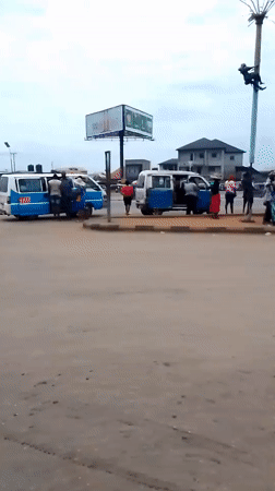Ordinary street life documented across Onitsha Nigeria morning hours