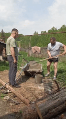 Construction crew works on building project in rural Russia