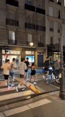 Evening street life documented across central Paris landmarks
