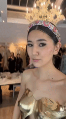 Fashion show with backstage preparation documented in Paris ballroom