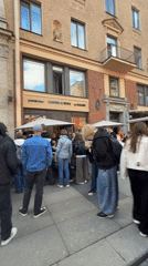 Street food vendors draw crowds outside Saint Petersburg restaurant