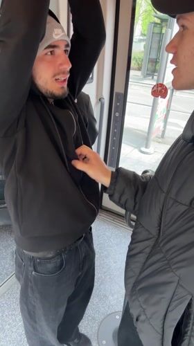 Two men observed on public transport in Strasbourg