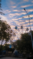 Evening at a Qarağandı park and its surrounding streets
