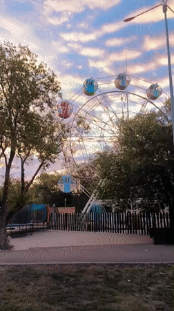 Evening at a Qarağandı park and its surrounding streets