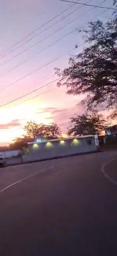 Colorful sunset documented across residential Tinaquillo, Venezuela