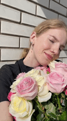 Woman with roses photographed in Izhevsk, Russia