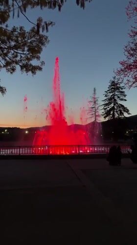 Color-changing fountain operates at twilight in Panagyurishte, Bulgaria