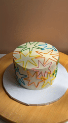 Baker decorates star-themed cake in Tel Aviv kitchen