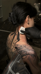 Moscow tattoo session and neon art documented by witnesses