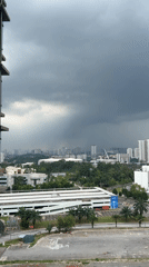 Dark clouds blanket Kuala Lumpur skyline Monday morning