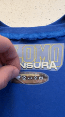 Custom shirt maker creates "PLOMO" designs in Buenos Aires