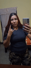 Woman poses for photos, cats spotted in Tinaquillo Venezuela