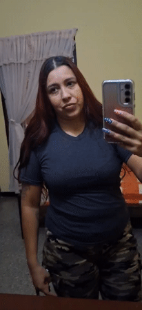 Woman poses for photos, cats spotted in Tinaquillo Venezuela