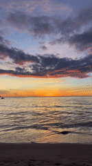 Da Nang beach at golden hour, sky full of color