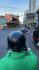 Grab riding and city life across a Nha Trang morning