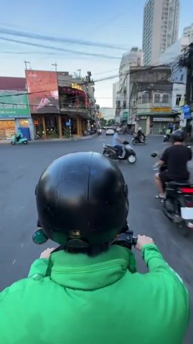 Grab riding and city life across a Nha Trang morning