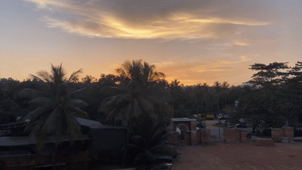 Dusk falls over a Malappuram construction site and surroundings