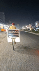 Routine street life documented across Lhokseumawe during midday period