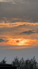 Golden hour fades to twilight over rural Dys, Poland