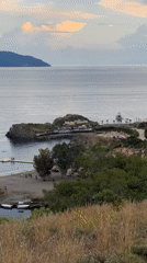 Hiker documents scenic coastal views during Fethiye hillside walk