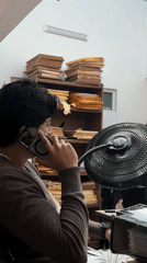 Man photographed during phone call in Puebla office
