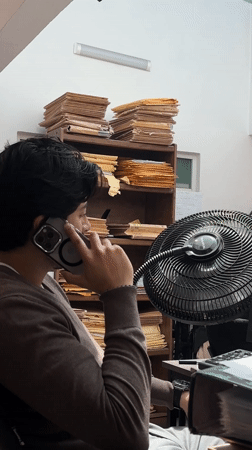 Man photographed during phone call in Puebla office