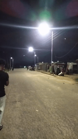 Nighttime street and bar life in Gura Top, Nigeria
