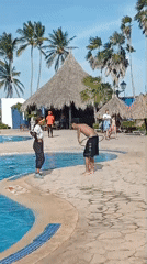 Resort guests enjoy poolside hula hoop activities in Venezuela