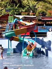 Families enjoy sunny day at Indonesian water park