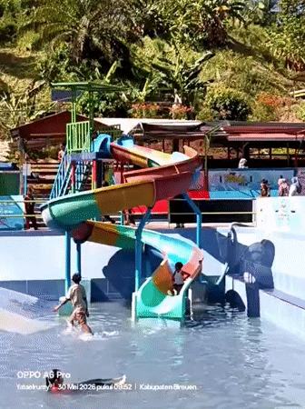 Families enjoy sunny day at Indonesian water park