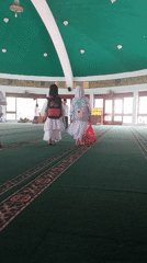 Kids hang out in a Jember mosque after prayers