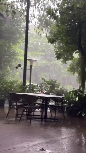 Rainy morning at an outdoor cafe in rural Laos
