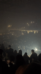 Concert crowd fills Buenos Aires venue with phones raised