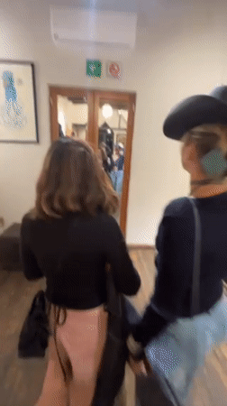 Women take selfies, photos in Mexico City store